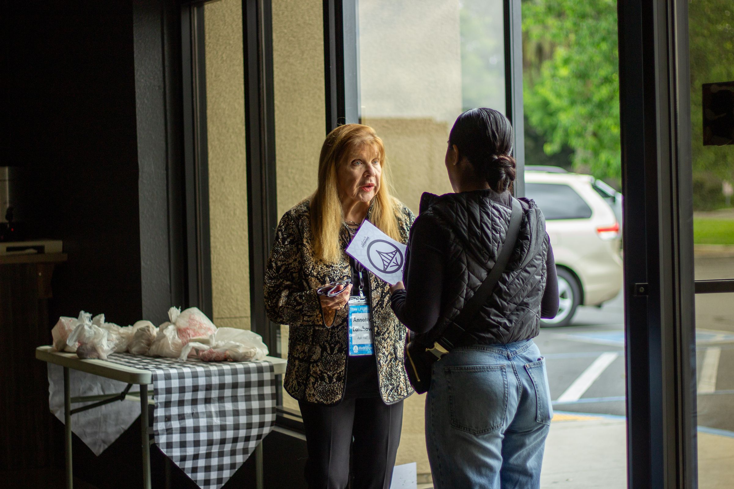 An ACTS Foundation grocery giveaway table